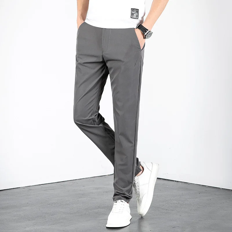 Весенне-летние новые эластичные дышащие мужские повседневные брюки Slim Fit, модные прямые брюки из нетканых материалов Изображение 1